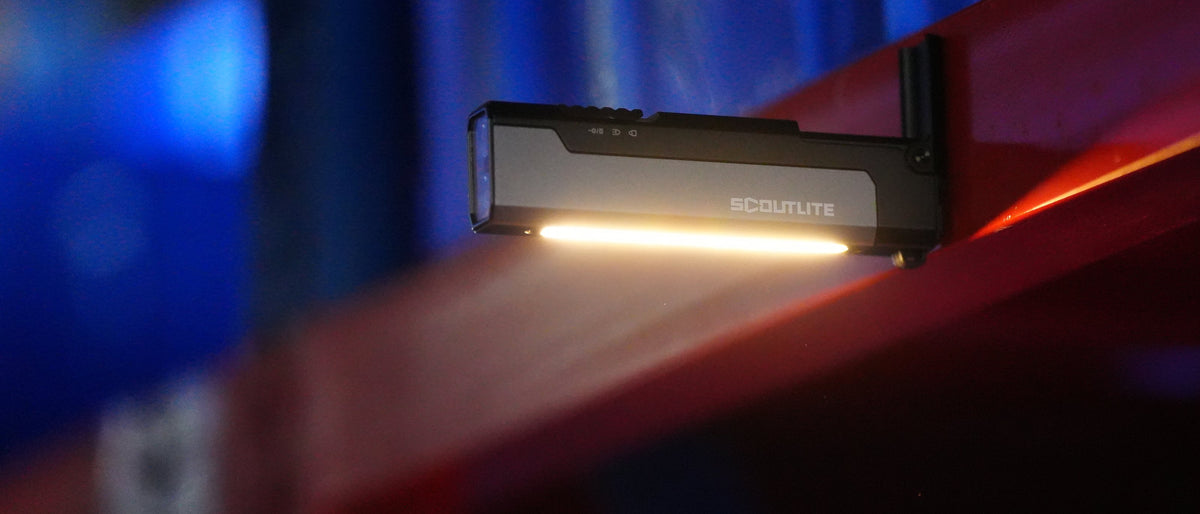 Scoutlite Vario 700 EDC flashlight clipped inside a jeans pocket