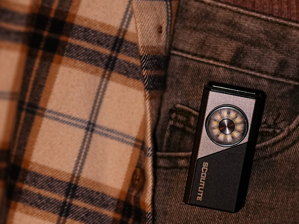 Scoutlite Vario 700 EDC flashlight clipped inside a jeans pocket